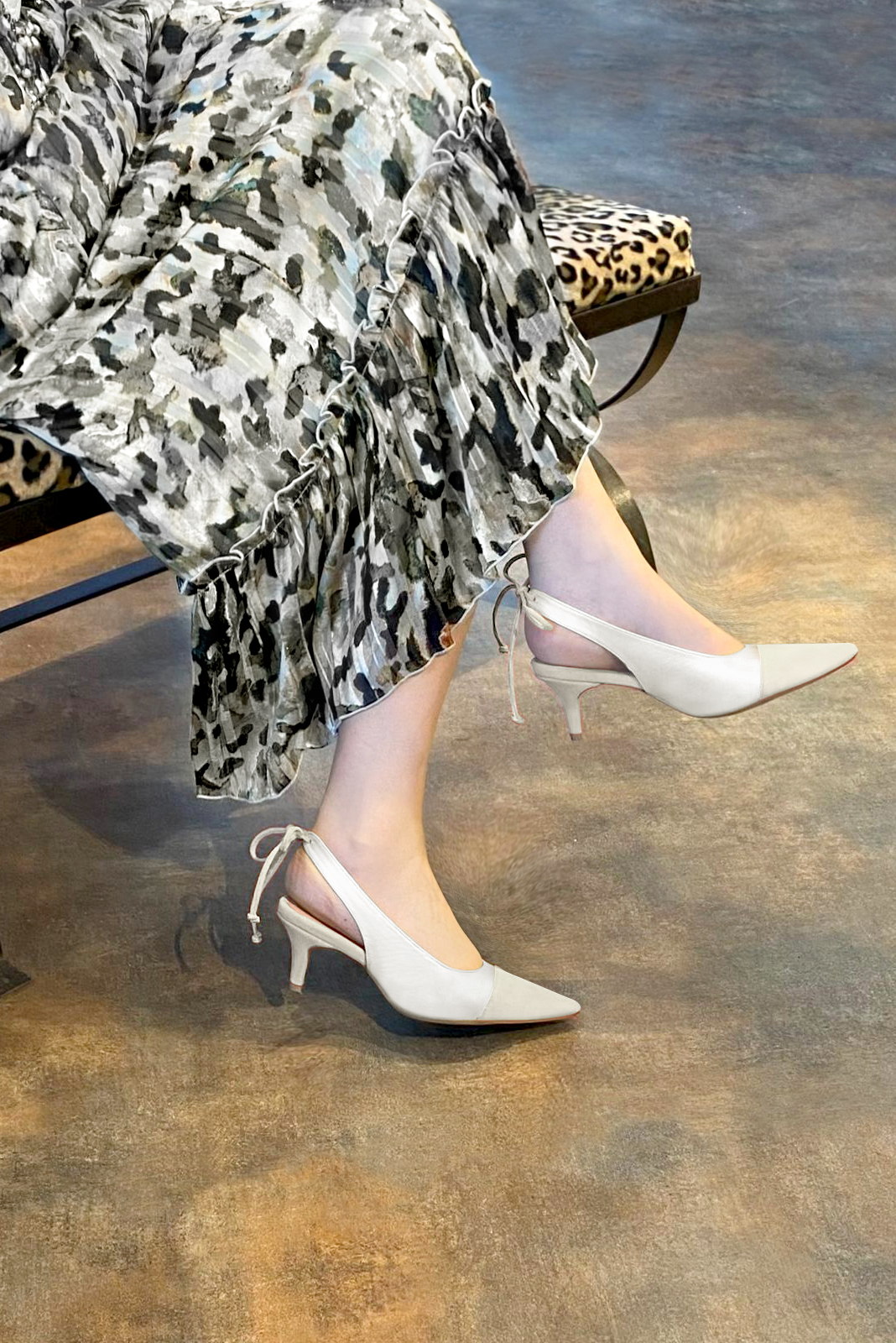 Off white women's slingback shoes. Pointed toe. Medium slim heel. Worn view - Florence KOOIJMAN